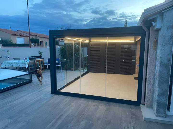 Véranda intégrée à la maison Llupia
