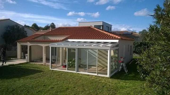 Maison avec véranda à toiture vitrée Llupia